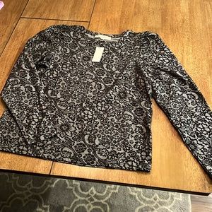 Black and grey Loft long sleeve blouse. Size medium. Never worn.